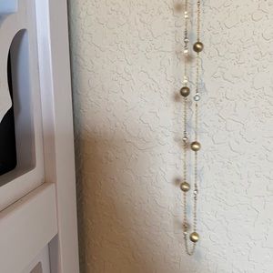 Long gold ball necklace